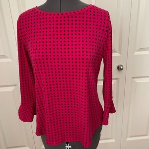 Scoop neck, long sleeve blouse.